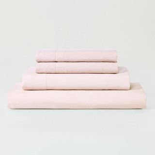 Best linen duvet covers on bed close up with duvet inset and pillows 