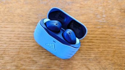 Adidas Z.N.E 01 ANC review: woman wearing earbuds
