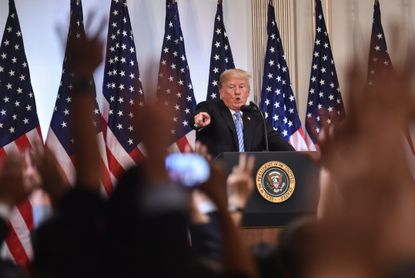 Trump speaks during a long press conference