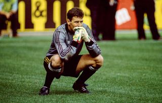 Republic of Ireland goalkeeper Packie Bonner looks on during the penalty shootout against Romania at the 1990 World Cup.