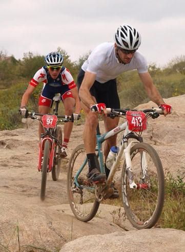 Zach Valdez tails Sid Taberlay at the Kenda Cup