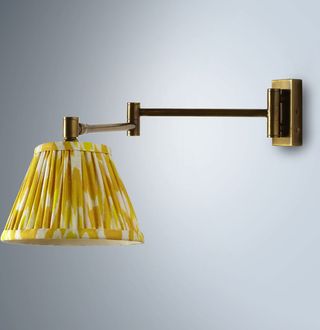 Lacey wall fitting, £79; and Empire shade in Yellikat, £30, Pooky