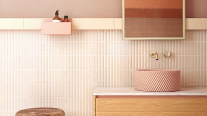 Pink ceramic sink in a colorful bathroom