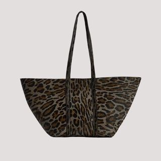 Flat lay image of a leopard print tote bag