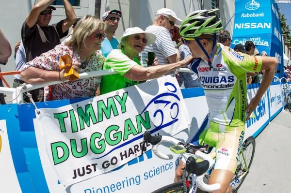 Tim Duggan signs autographs at the start for his fan club