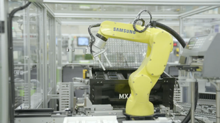 Photo of a robot arm in Samsung's assembly line