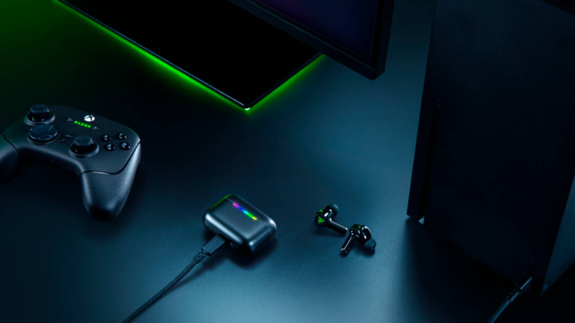 Image of the Hammerhead V3 X Hyperspeed for Xbox, sitting on a black gaming desk surrounded by matching Razer accessories.