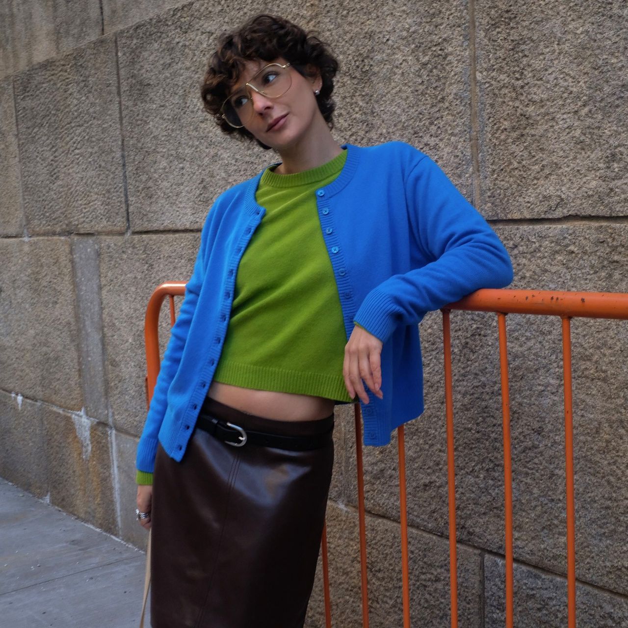 Influencer wearing colorful J.Crew sweaters