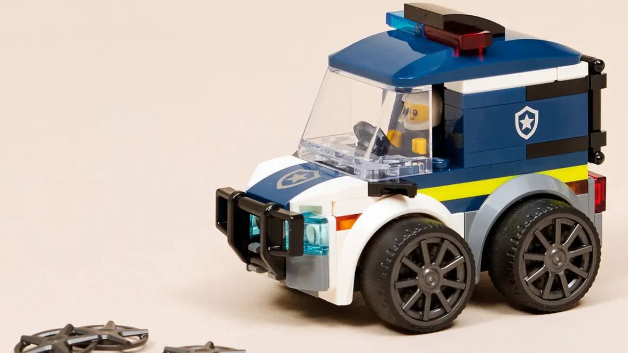 Lego Rides - Police Truck set on a pink background