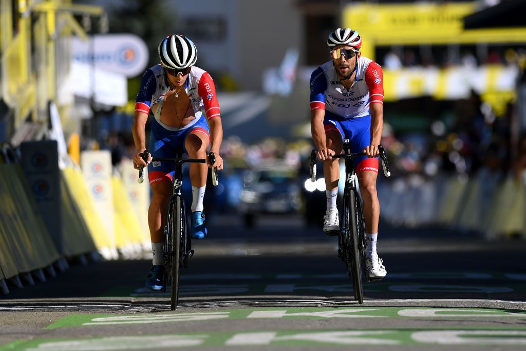 ALPE DHUEZ FRANCE JULY 14 LR Valentin Madouas of France and Thibaut Pinot of France and Team Groupama FDJ cross the finishing line during the 109th Tour de France 2022 Stage 12 a 1651km stage from Brianon to LAlpe dHuez 1471m TDF2022 WorldTour on July 14 2022 in Alpe dHuez France Photo by Alex BroadwayGetty Images