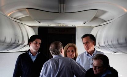 Mitt Romney speaks with son Tagg Romney, campaign advisor Stuart Stevens, and wife Ann Romney aboard a plane in January: Stevens is described in Politico's report as an eccentric who wears to