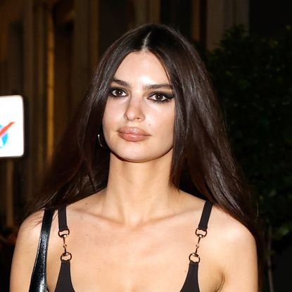 Emily Ratajkowski is seen arriving at the Gucci FW26 Dinner at Baretto on February 27, 2026 in Milan, Italy wearing a Gucci Horsebit Dress and a Jackie Slim Bag