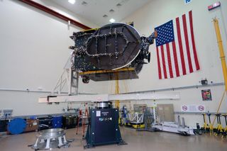 The JCSAT-16 satellite is prepared for launch by Space Systems Loral engineers ahead of a planned Aug. 14, 2016 launch on a SpaceX Falcon 9 rocket.