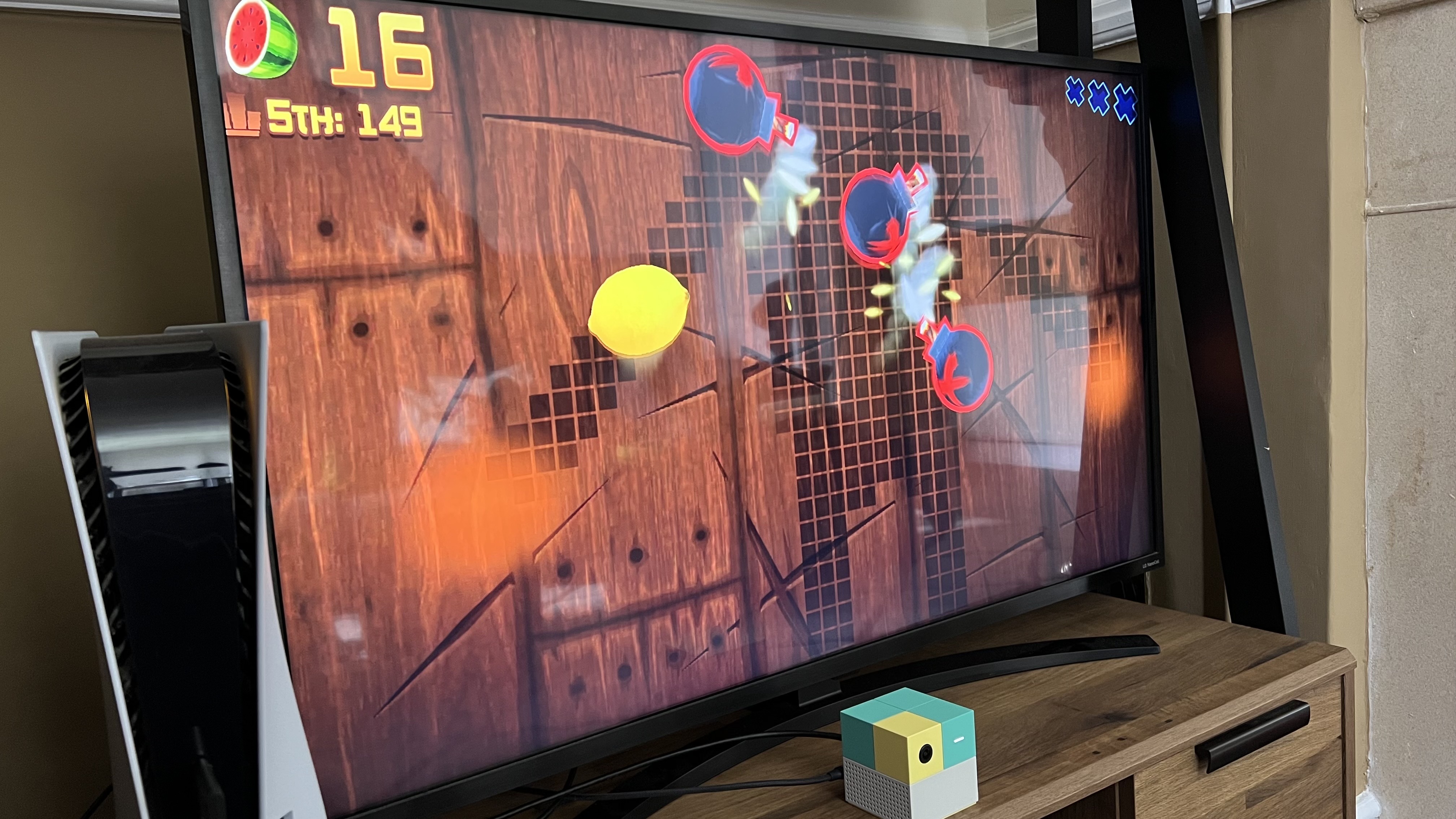 Nex Playground running Fruit Ninja while a player plays