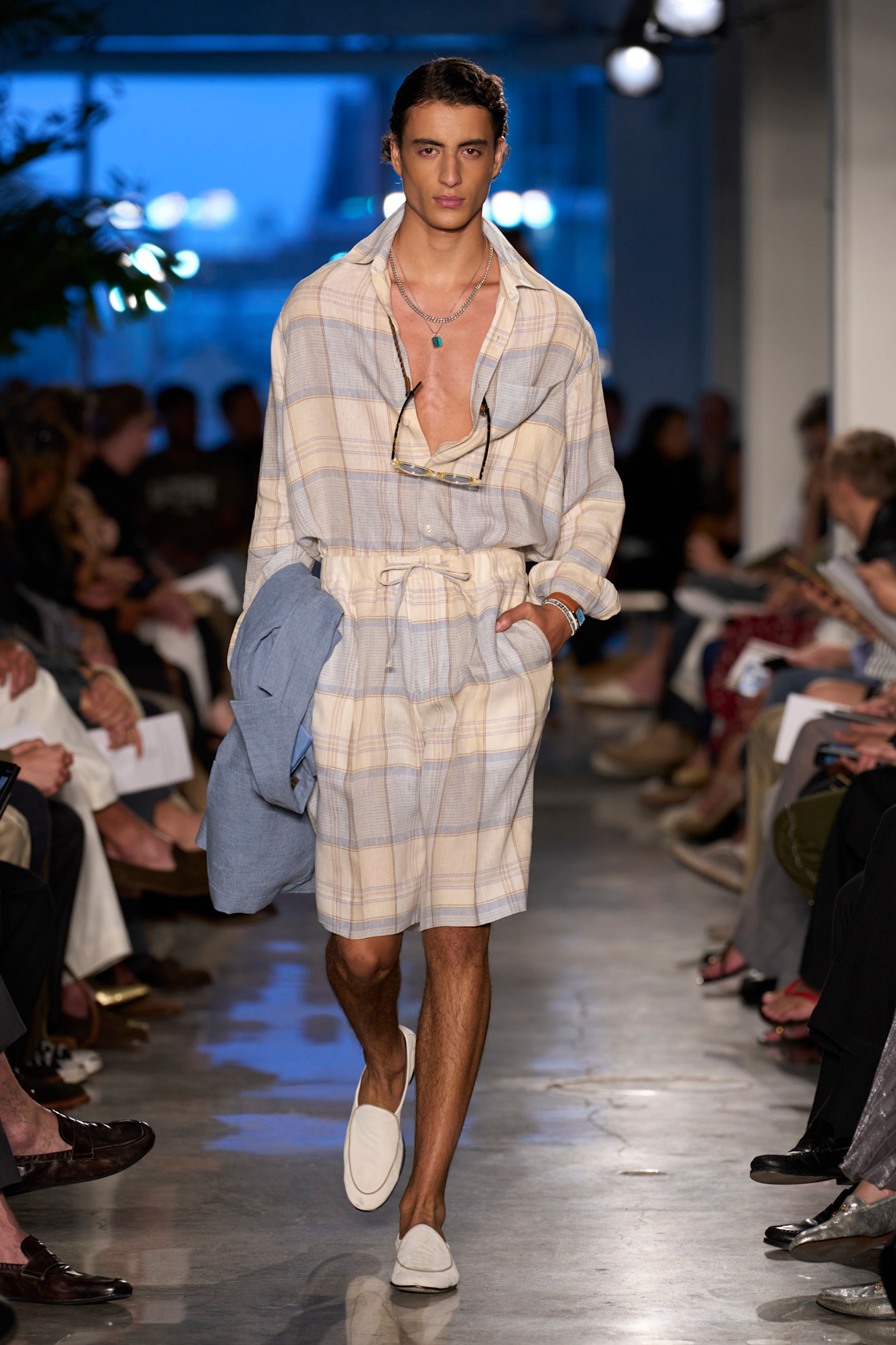A model wore white loafers on the Todd Snyder Spring 2026 runway