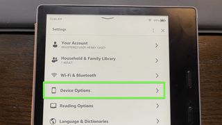 A Kindle Oasis with "Device Options" highlighted.