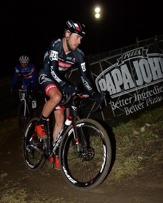 Danny Summerhill (K-Edge Felt) riding an uphill switch back while chasing Logan Owen