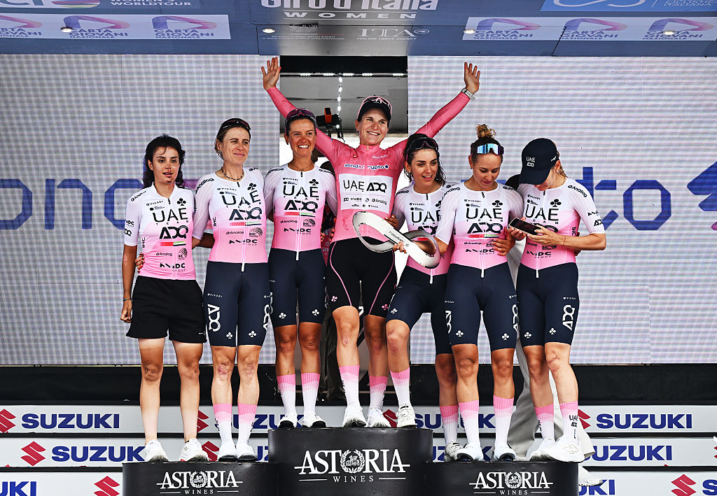 IMOLA, ITALY - JULY 13: Elisa Longo Borghini of Italy and UAE Team ADQ - Pink Leader Jersey celebrates at podium as overall final race winner with her teammates Alena Amialiusik of Belarus, Brodie Chapman of Australia, Eleonora Camilla Gasparrini of Italy, Erica Magnaldi of Italy, Greta Marturano of Italy, Silvia Persico of Italy and UAE Team ADQ during the 36th Giro d'Italia Women 2025, Stage 8 a 134km stage from Forli to Imola / #UCIWWT / on July 13, 2025 in Imola, Italy. (Photo by Luc Claessen/Getty Images)