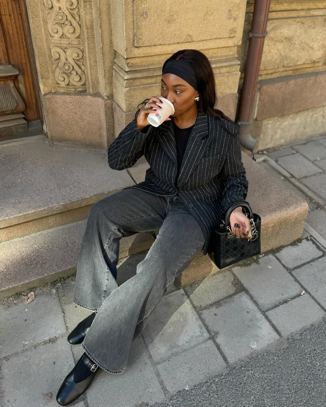 Stylish women wearing grey jeans
