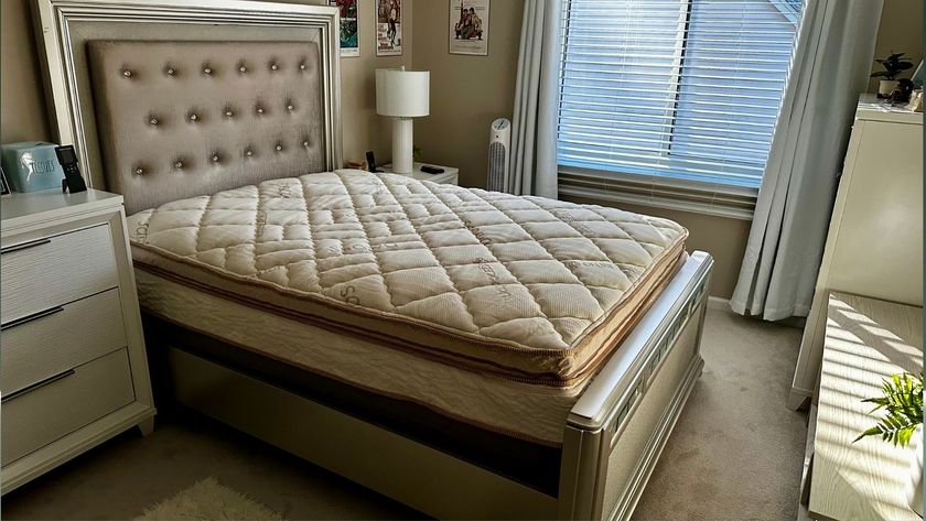 The image shows the Saatva Solaire Adjustable Firmness Mattress set up in our tester's home