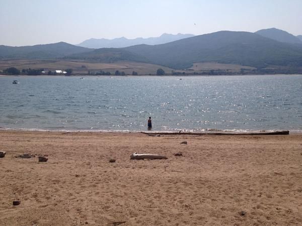 Cameron Hooyer takes a swim after completing the Mt. Ogden 100k. He won the 15-25 year age group at age 17!