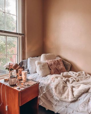A brown and beige cozy dorm room