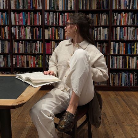 Woman reading in a library