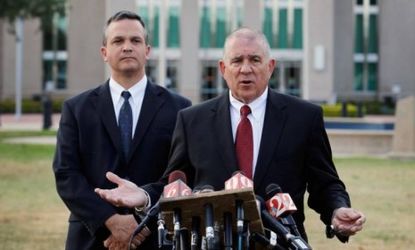 Craig Sonner, left, and Hal Uhrig, attorneys for George Zimmerman, said at a press conference that they have lost contact with their client, who shot and killed Trayvon Martin.
