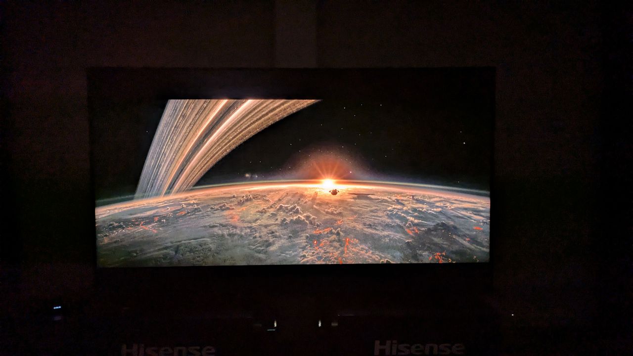 Hisense 116UX RGB mini-LED TV with shot of planet from Alien: Romulus on screen