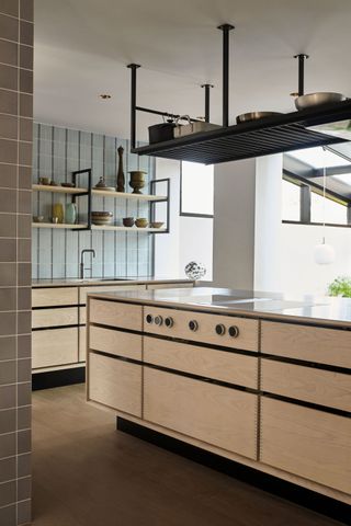 a wood ply kitchen with a shadow gap in a modern home