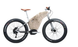 Bike with light brown fur over the frame