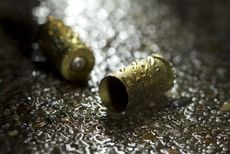 Bullets on ground on a rainy day.