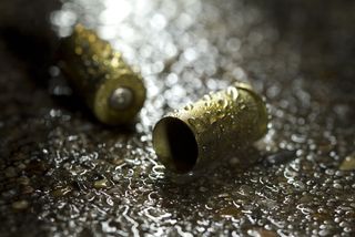 Bullets on ground on a rainy day.