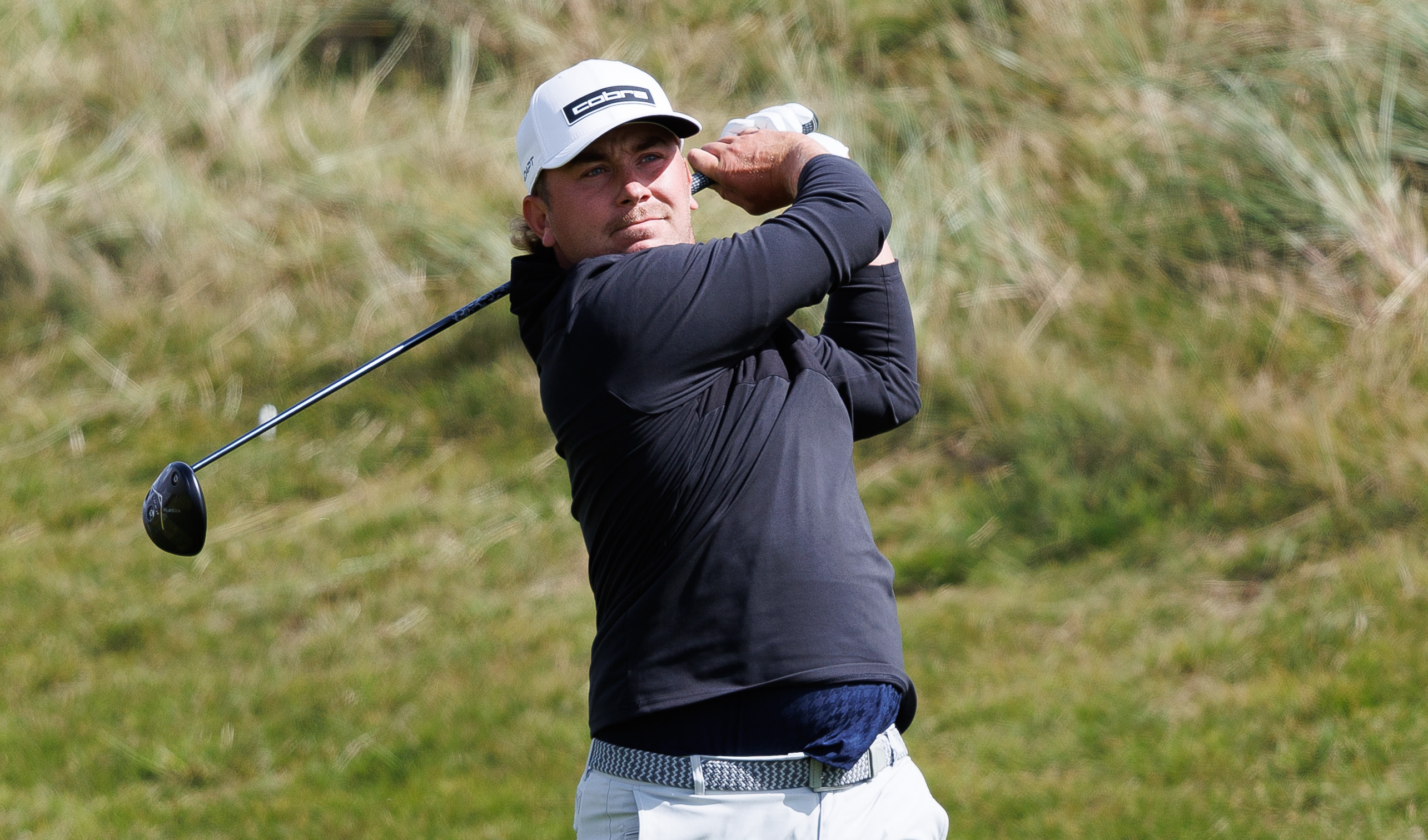 Oliver Lindell hits a driver off the tee