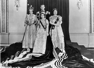 The Queen and family at her 1953 coronation.