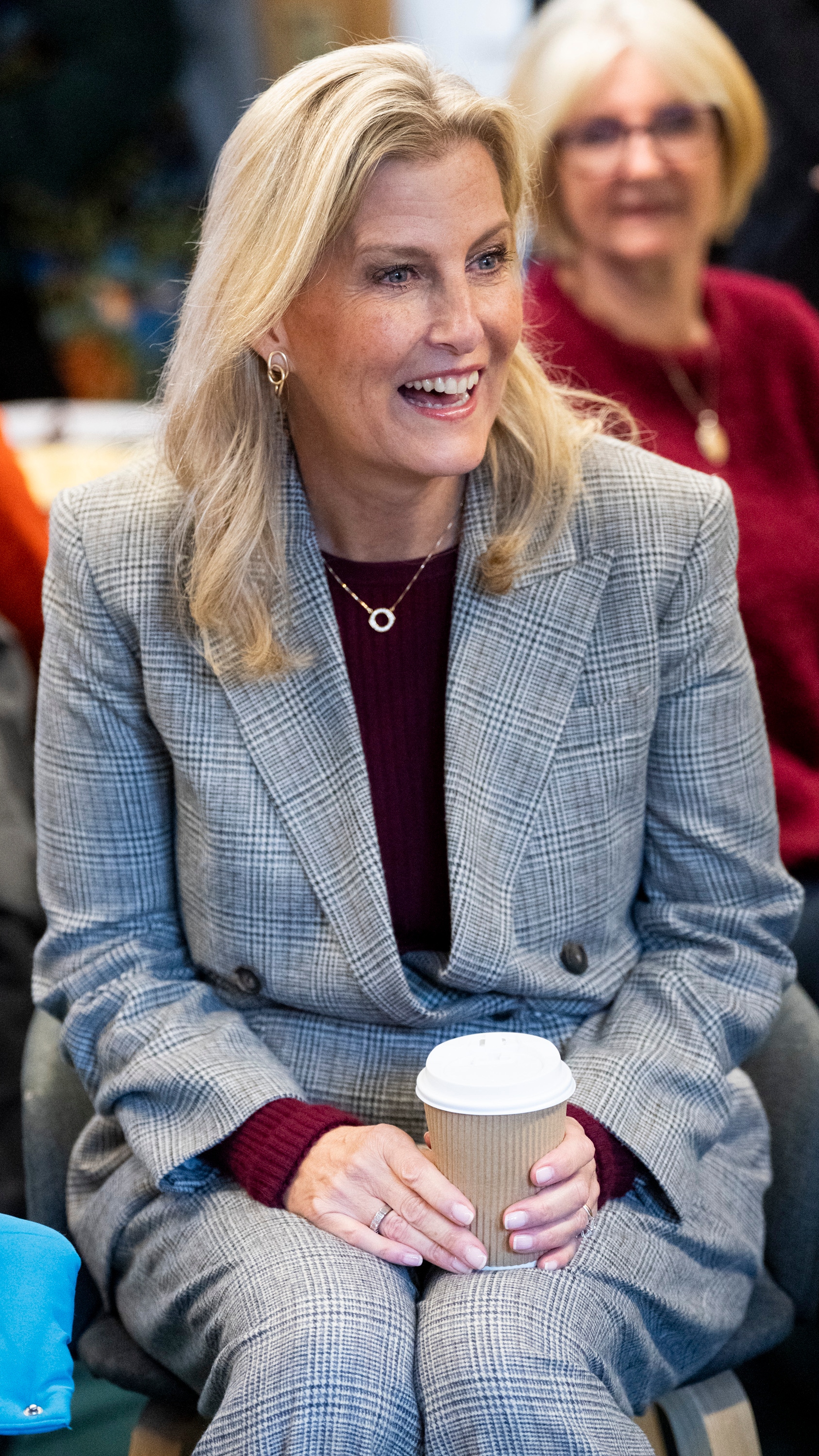Sophie, Duchess of Edinburgh holds a cup and listens during a visit to Windale Community Hub on November 26, 2025