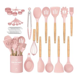 A set of pink kitchen utensils
