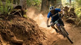 Mountain bike rider kicking up dust at the Cascadia Dirt Cup