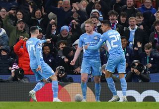City now turn their attention to Liverpool after a goal from Kevin De Bruyne (centre) earned them victory over Atletico Madrid