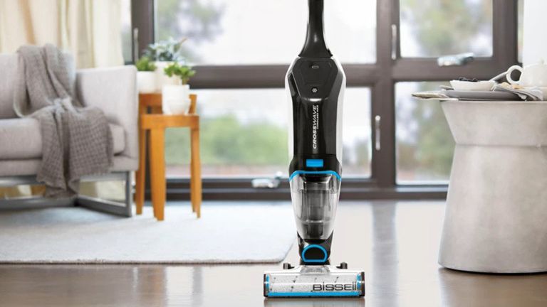 A Bissell Crosswave 3-in-1 hard floor, carpet and rug cleaner in living room