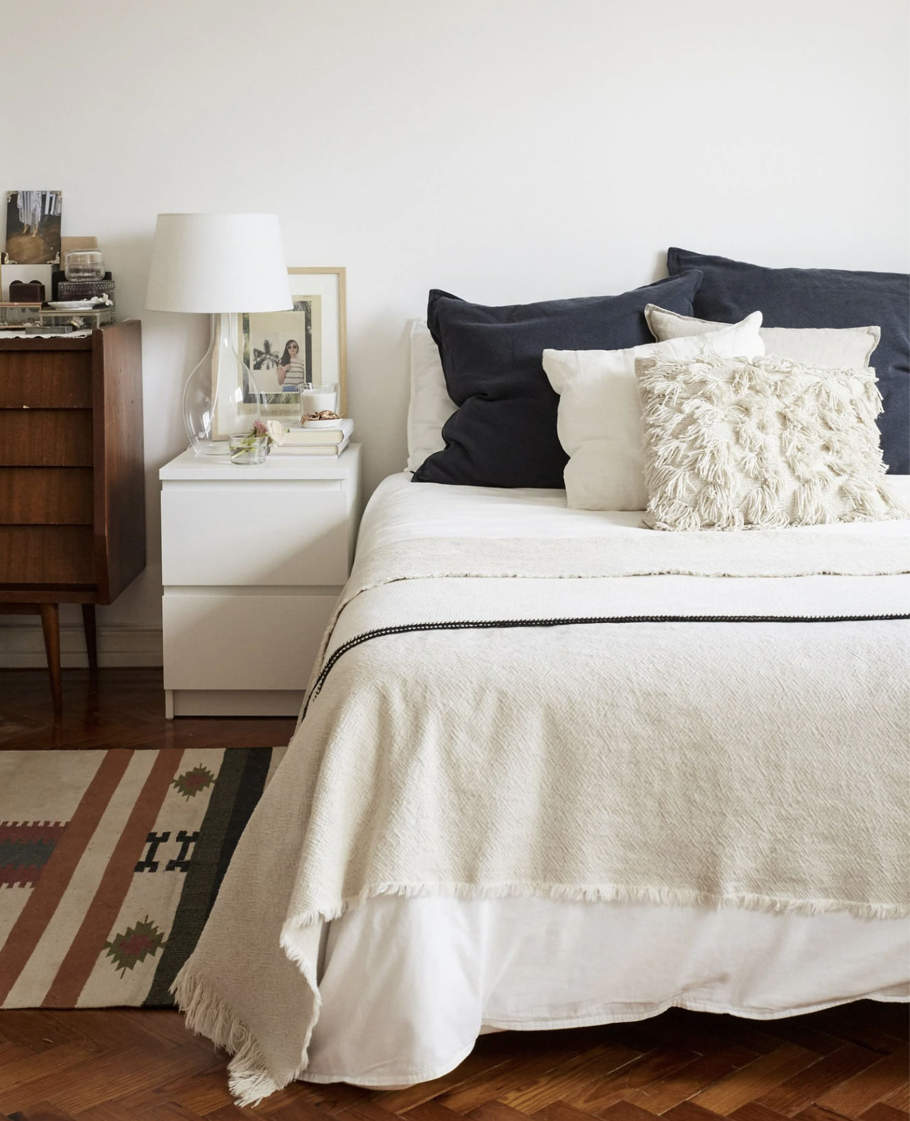 Bedroom with a mix of vintage and ikea furniture