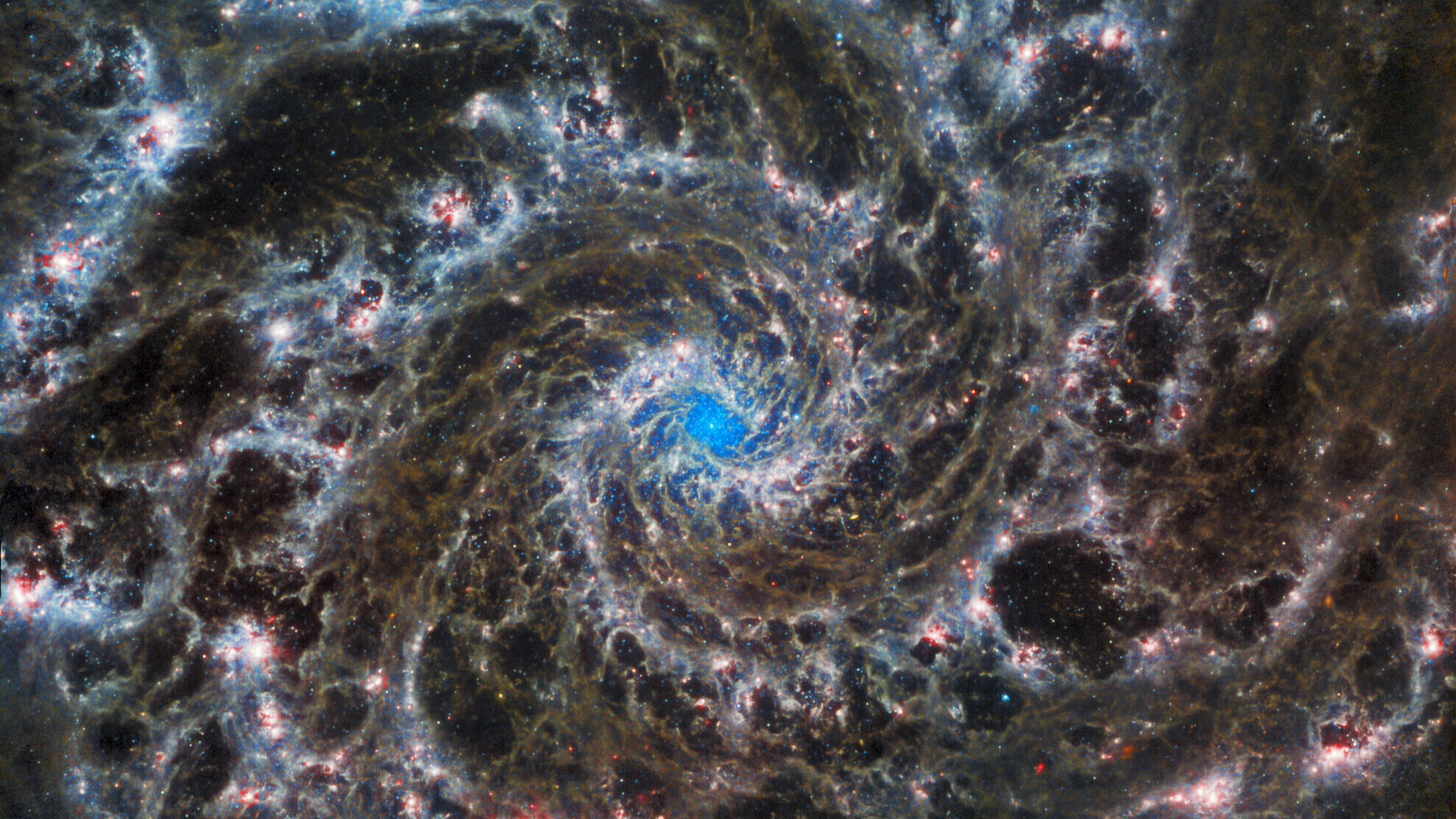 a swirl of reds and blues in space