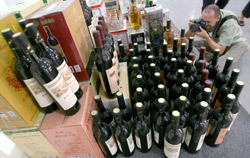 Counterfeit wine bottles on display in Beijing, 12 June 2007.