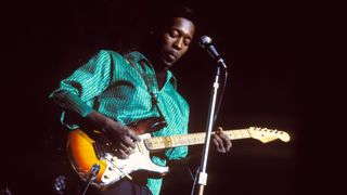 American blues guitarist and singer Buddy Guy performs live playing a Fender Stratocaster guitar on the American Folk Blues Festival tour in London in October 1965.
