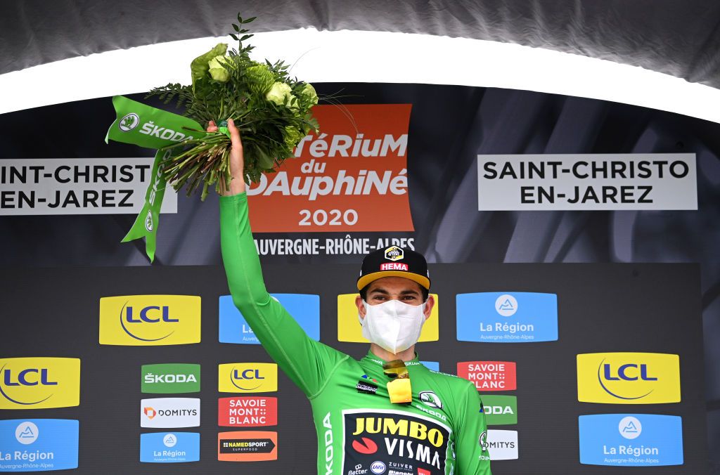 SAINT CHRISTO EN JAREZ FRANCE AUGUST 12 Podium Wout Van Aert of Belgium and Team Jumbo Visma Green Points Jersey Celebration Flowers Covid safety measures during the 72nd Criterium du Dauphine 2020 Stage 1 a 2185km stage from Clermont Ferrand to Saint Christo en Jarez 752m dauphine Dauphin on August 12 2020 in Saint Christo en Jarez France Photo by AnneChristine Poujoulat PoolGetty Images