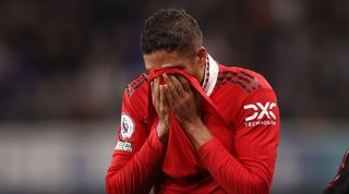 Manchester United defender Raphael Varane leaves the pitch in tears after picking up an injury in the Premier League game at Chelsea.
