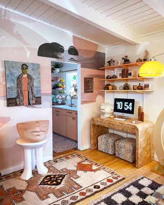 Coloreful hallway with retro side table and layered shelving