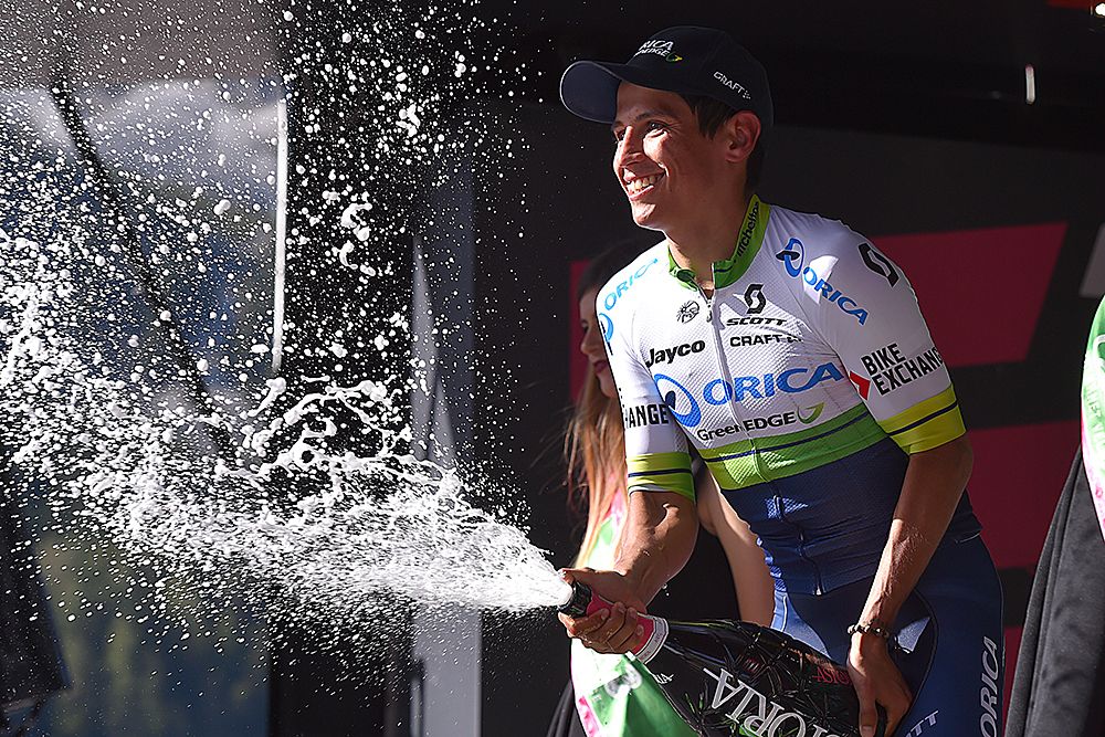 Esteban Chaves (Orica-GreenEdge) celebrates his stage victory with a bottle of champagne