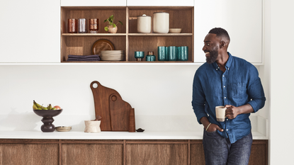 Chef Eric Adjepong in a kitchen decorated with items from his collection with Crate and Barrel