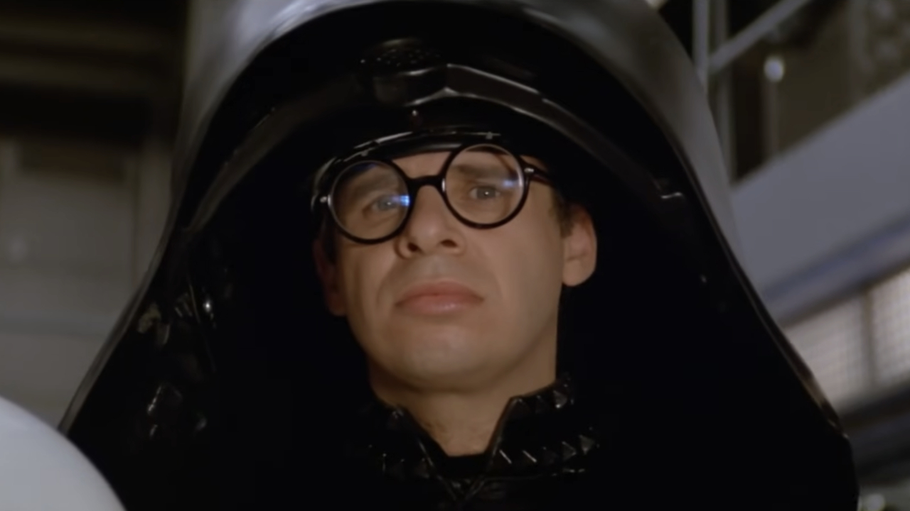 Dark Helmet (Rick Moranis) watches footage on his monitor in Spaceballs.